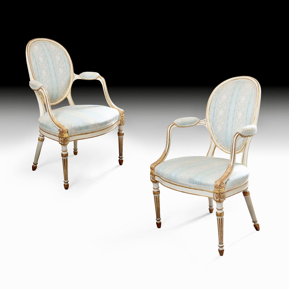 George III parcel gilt painted pair of chairs