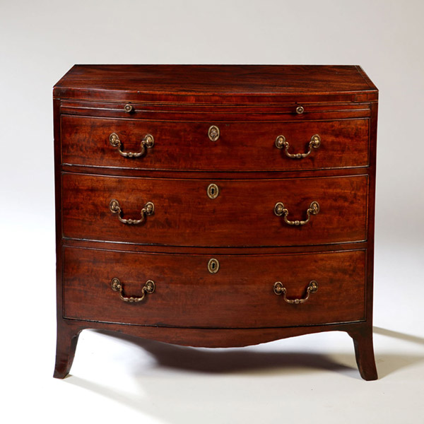 Alexander George Fine Antiques | Collection | Tables 27 George III Sheraton period bow-fronted caddy topped mahogany chest of drawers