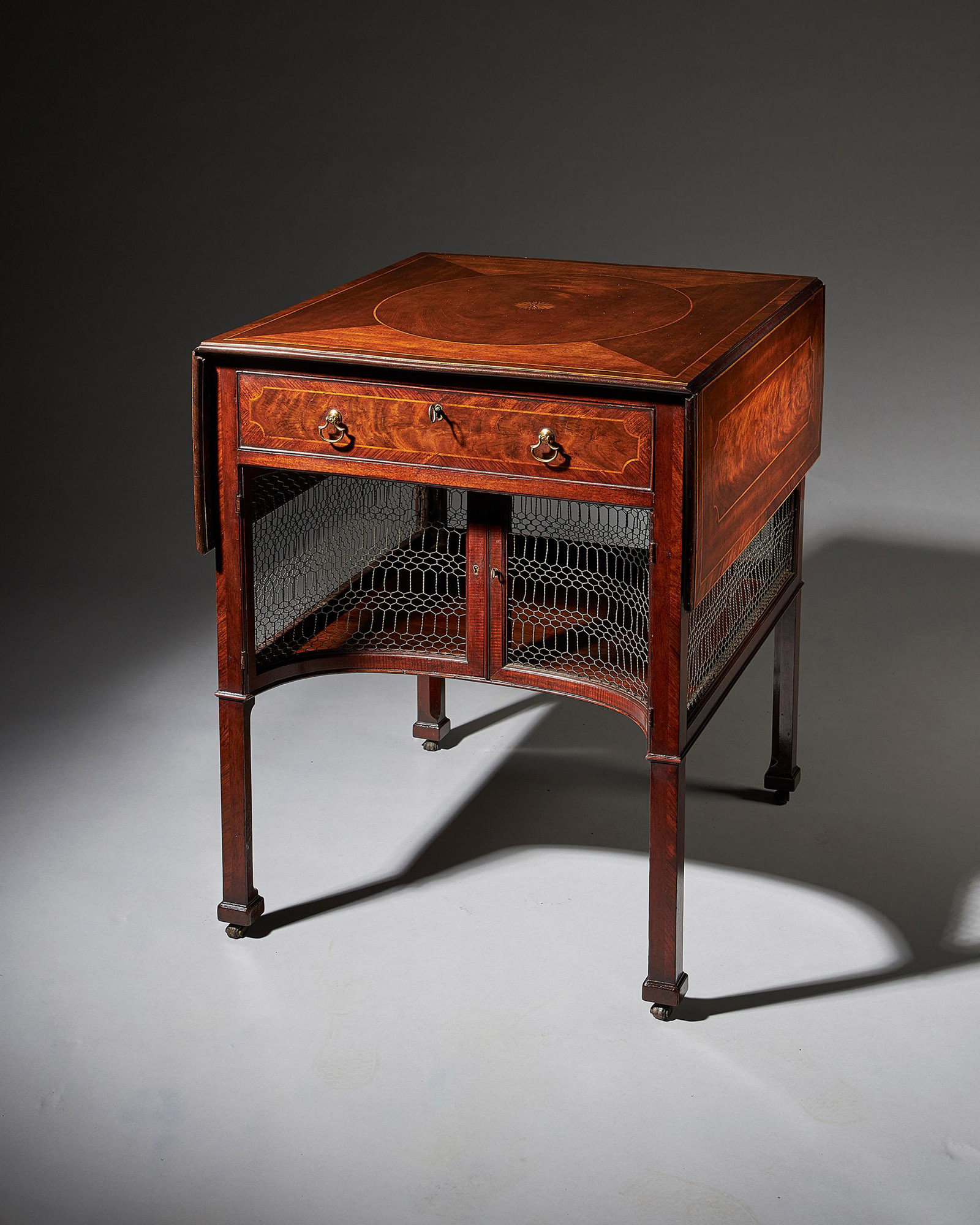 An extremely fine and rare early George III mahogany supper table plausibly by Thomas Chippendale 1
