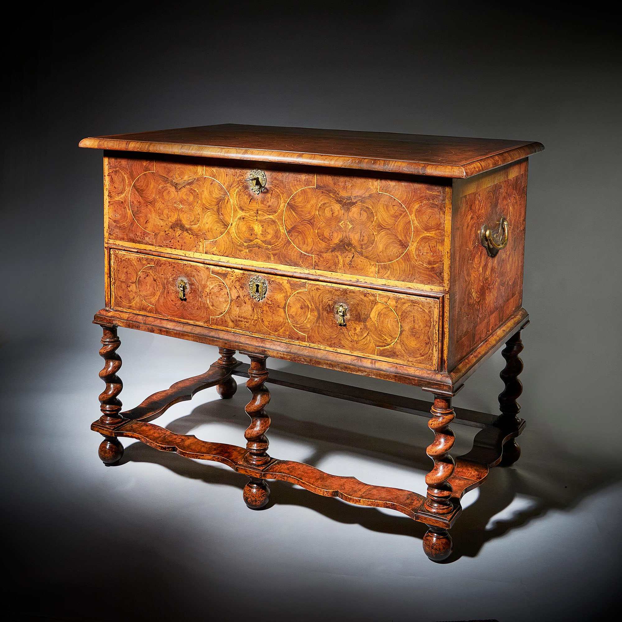A fine and extremely rare 17th century William and Mary baroque olive oyster chest on stand or 'table box', circa 1675-1690. 16