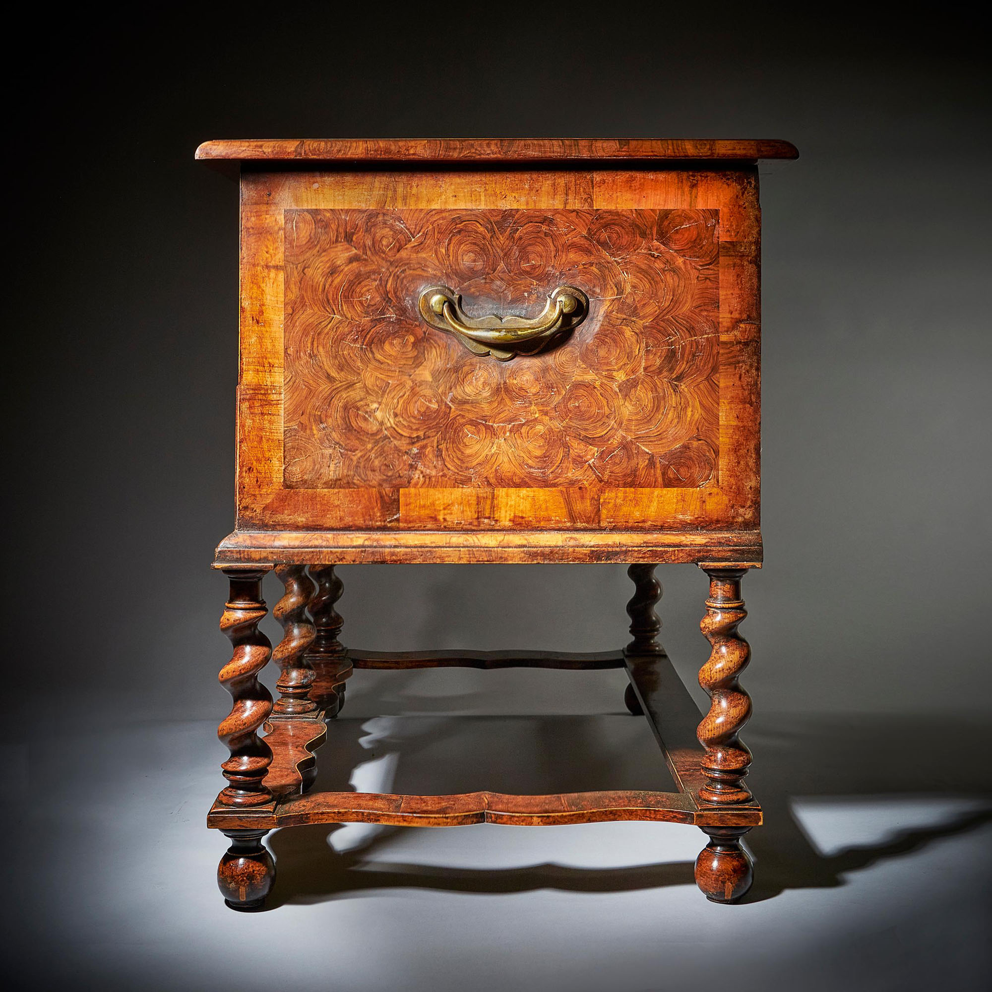 A fine and extremely rare 17th century William and Mary baroque olive oyster chest on stand or 'table box', circa 1675-1690. 18