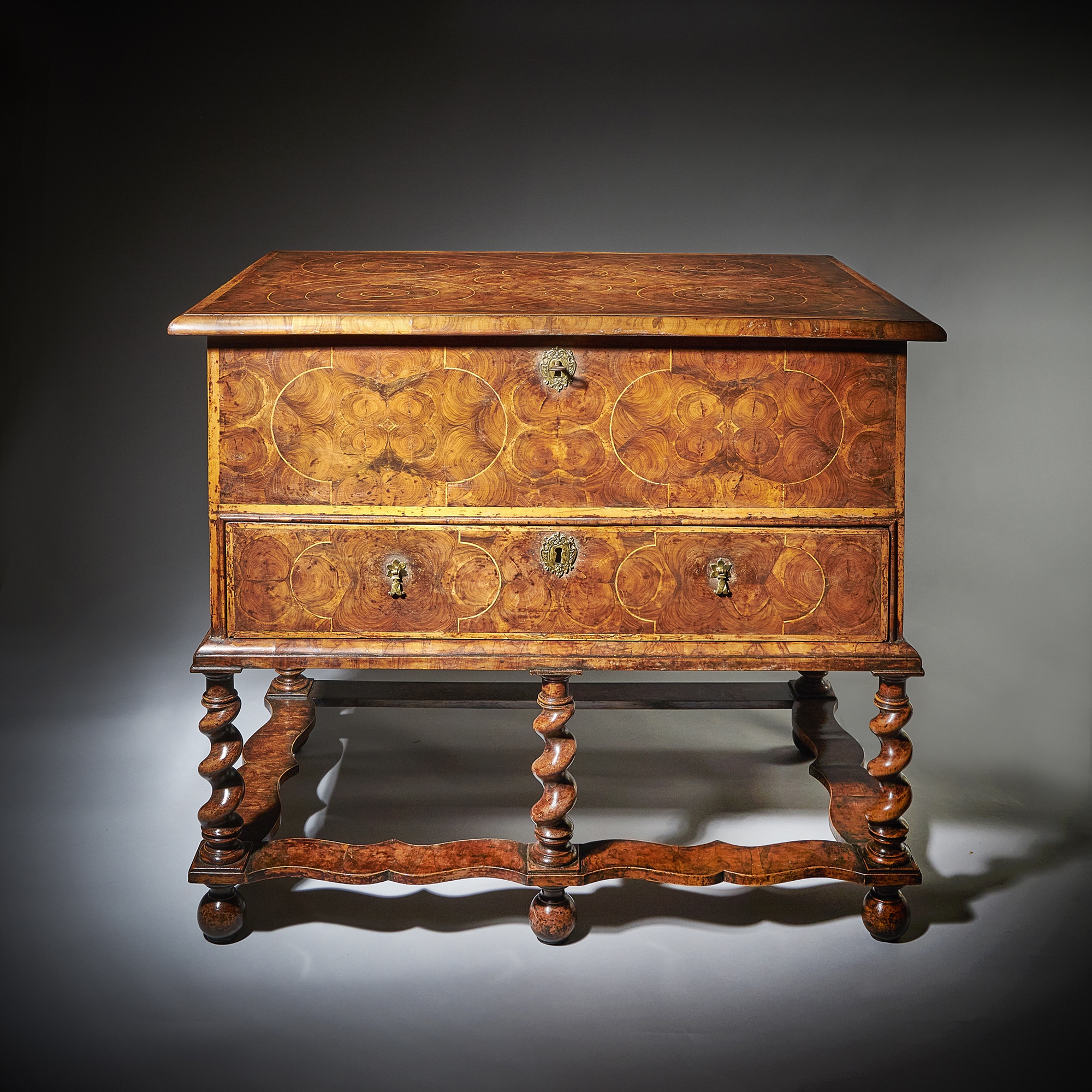 A fine and extremely rare 17th century William and Mary baroque olive oyster chest on stand or 'table box', circa 1675-1690. 15