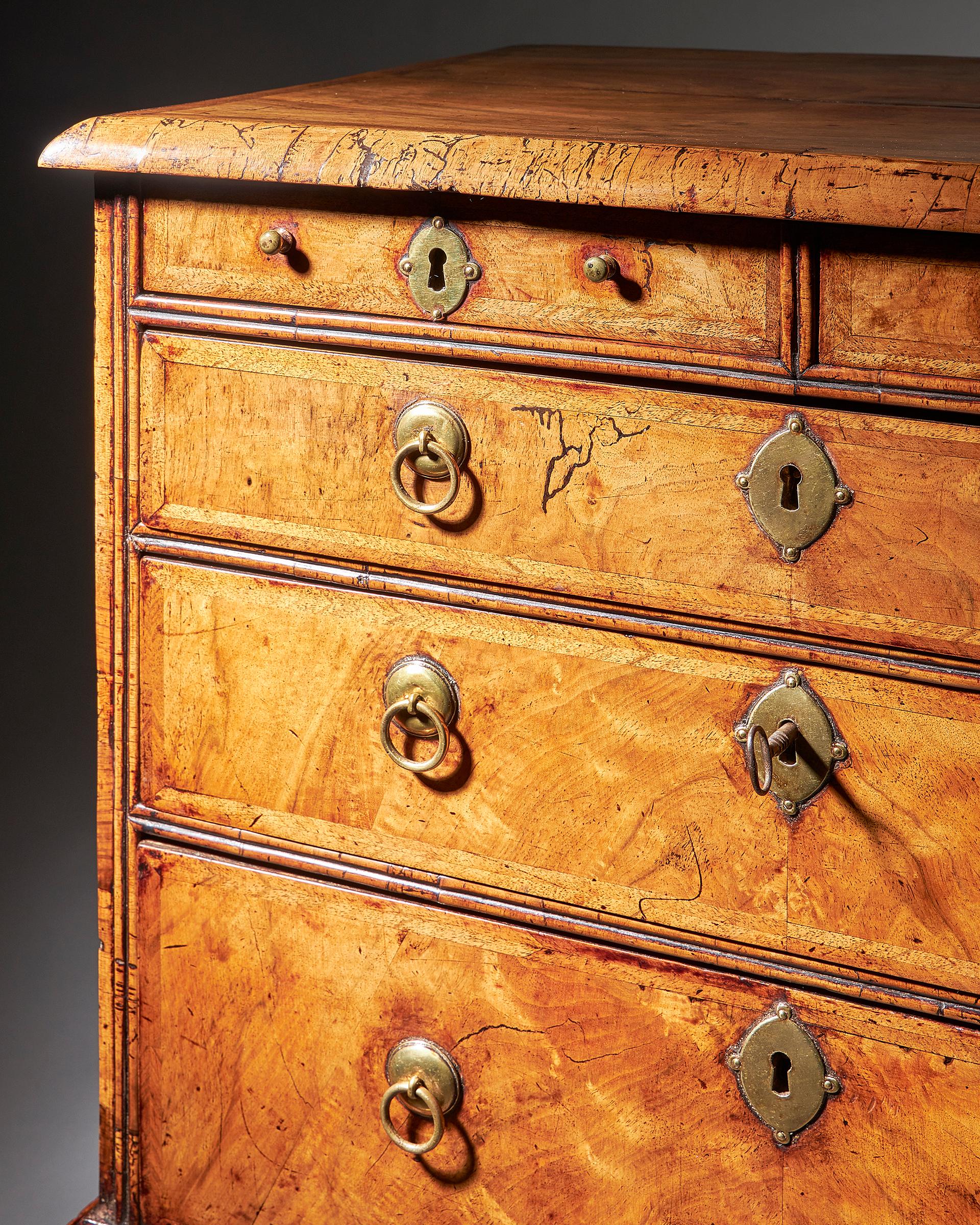 An extremely rare George I walnut chest of small proportions on ball and bracket-10