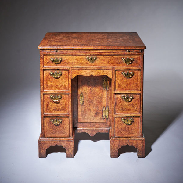 A Unique 18th Century George II Pollard Oak and Walnut Kneehole Desk, Circa 1730