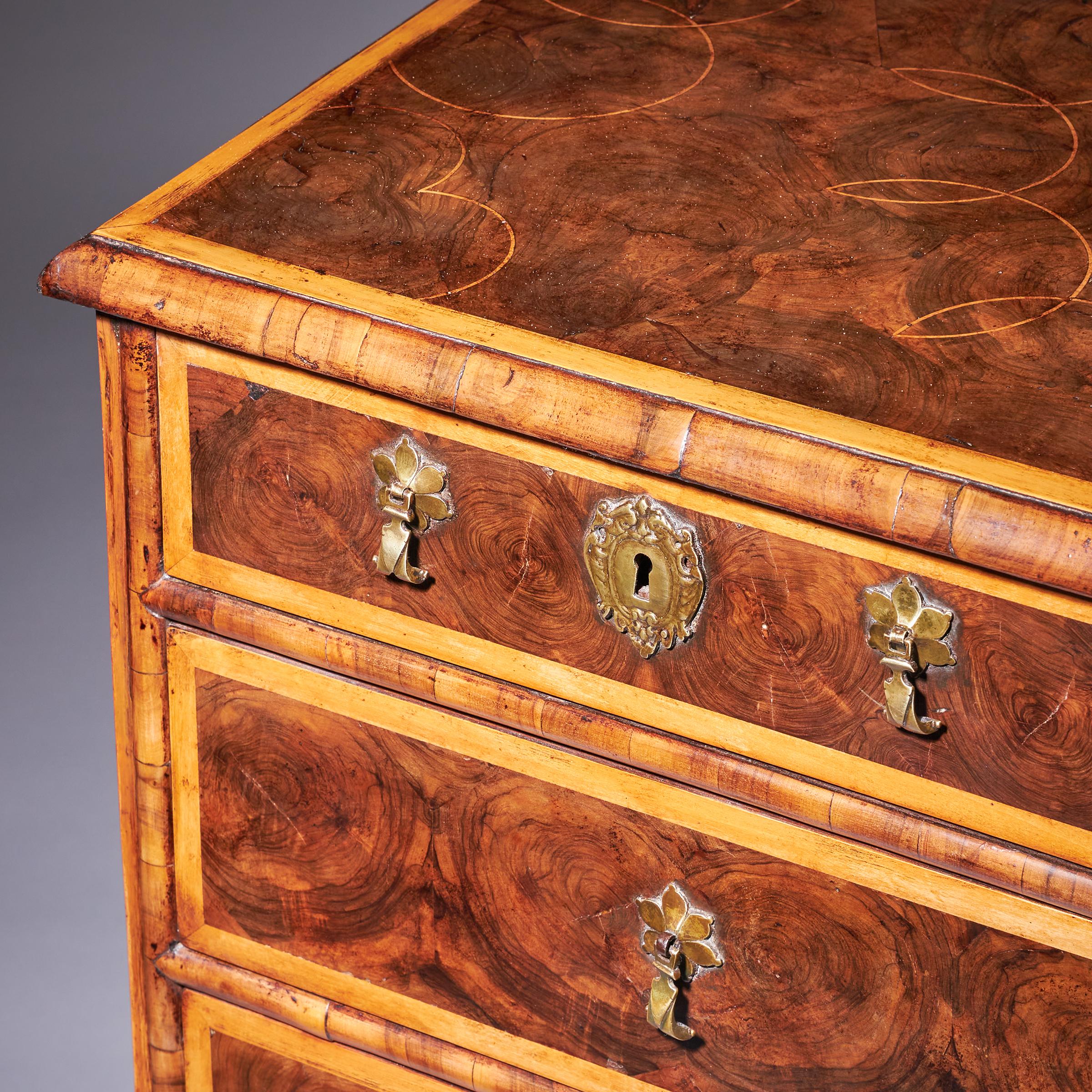 17th Century William and Mary Olive Oyster Chest of drawers, Circa 1690. England 18